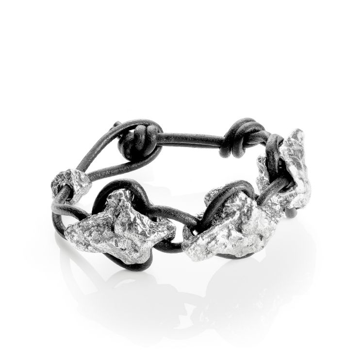 Pilt Lummus Kivikõva "Kolm Kivi Päikesest" käepael